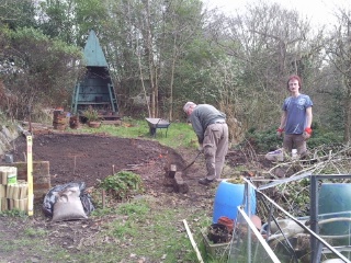Paul and Lee at work on the herb tablet project, preparing and levelling the ground.